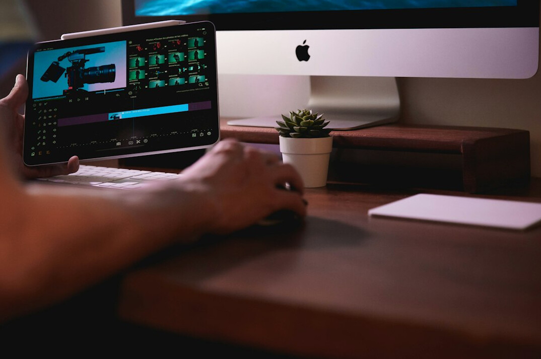 professional video editor at desk